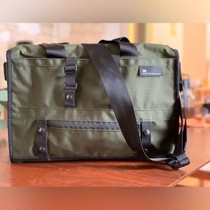 Mission Workshop Transit laptop bag, green cordura, attaches to bike front rack